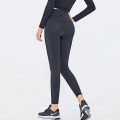 Leggings deportivos transpirables Gimnasio de yoga medias de jogging Mujeres Correr pantalones Leggings con bolsillos